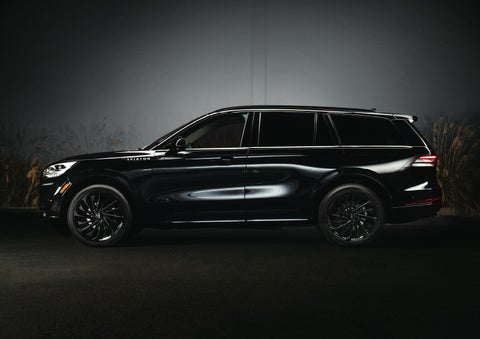 A 2024 Lincoln Aviator® SUV is shown in the Infinite Black exterior color | Crossroads Lincoln of Southern Pines in Southern Pines NC