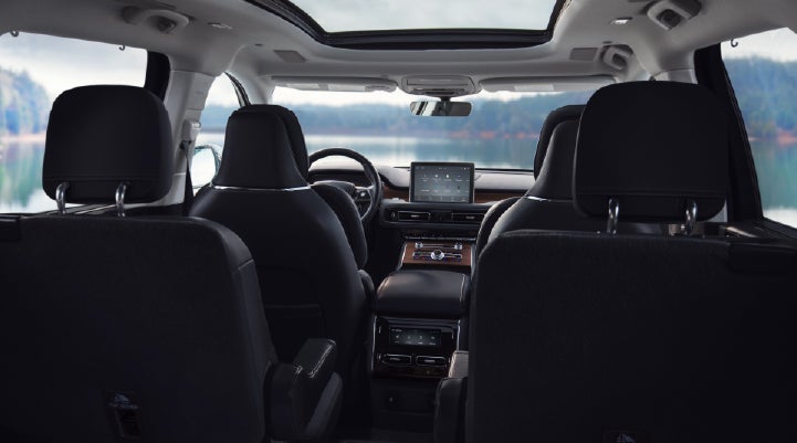 The interior of a 2024 Lincoln Aviator® SUV from behind the second row | Crossroads Lincoln of Southern Pines in Southern Pines NC