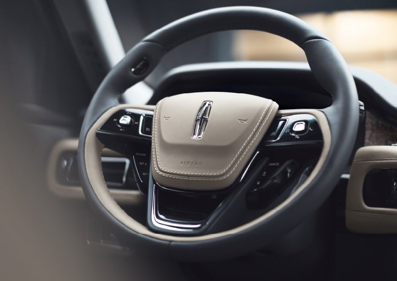 The intuitively placed controls of the steering wheel on a 2024 Lincoln Aviator® SUV | Crossroads Lincoln of Southern Pines in Southern Pines NC